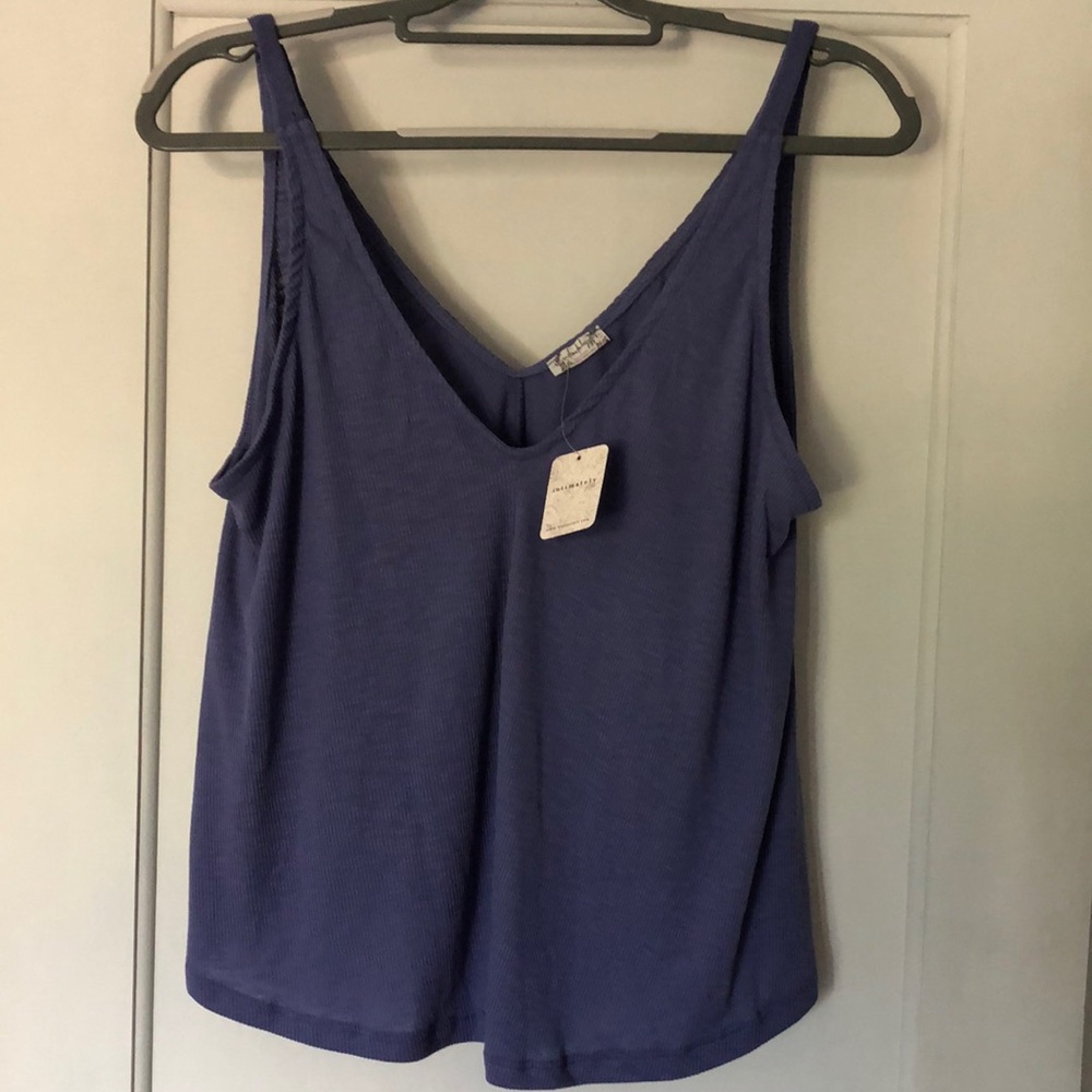 NWT Free‎ People intimately ribbed lavender tank top. Oversized small.